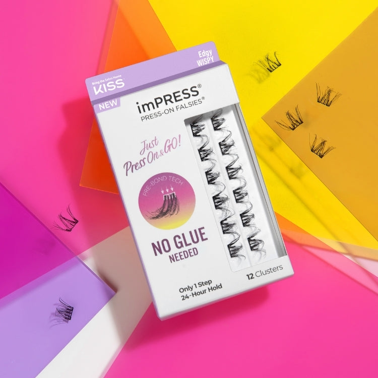 imPRESS Press-On Falsies 14mm-16mm | Edgy Wispy in een stijlvolle verpakking met zwarte wimpers en kleurrijke achtergrond.