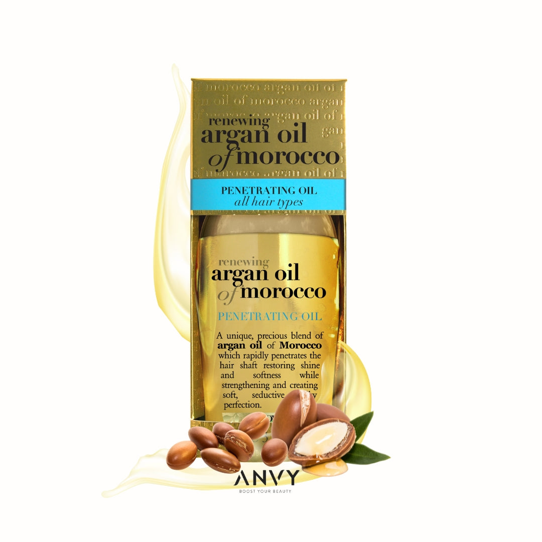 Renewing + Argan Oil Of Morocco Penetrating Oil in een gouden verpakking met een transparante fles en argannoten.