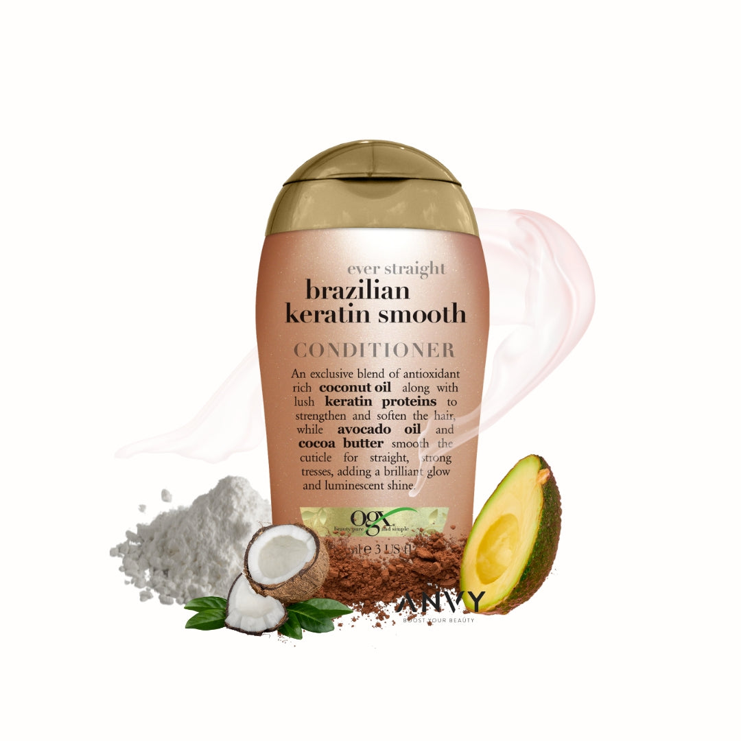 Travel size Brazilian Keratin Smooth Conditioner van OGX in een ronde, roze verpakking met gouden dop en ingrediënten zoal...