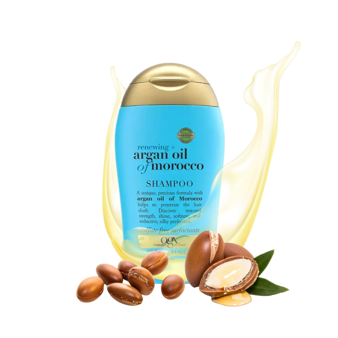 Travel Size Renewing Argan Oil Of Morocco Shampoo in een lichtblauwe fles met gouden dop, omringd door argannoten.