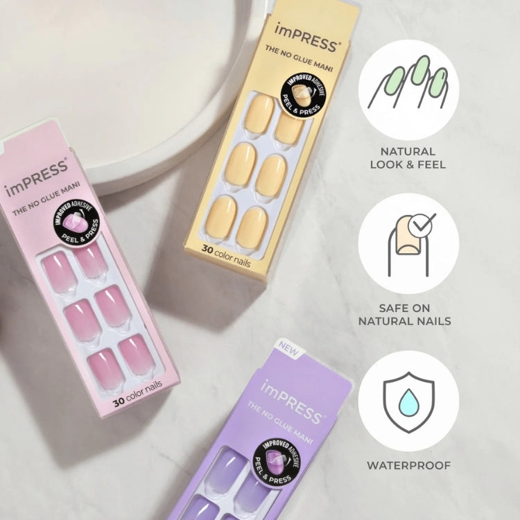 imPRESS Color - Point Pink, set van kunstnagels in een zachte roze tint, verpakt in een kleurrijke doos.