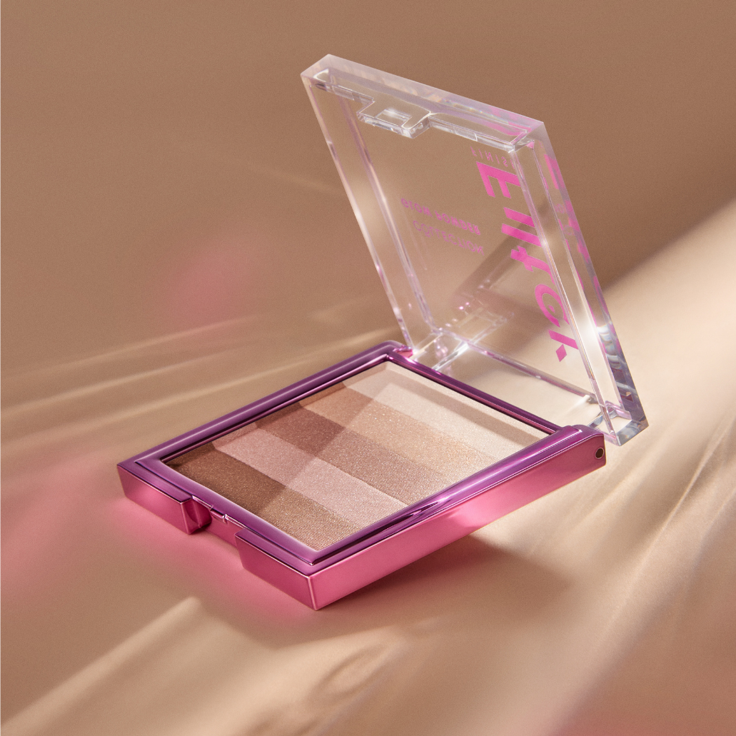 Filter Finish Glow Powder - bronze in een glanzende, vierkante verpakking met verschillende bronstinten.