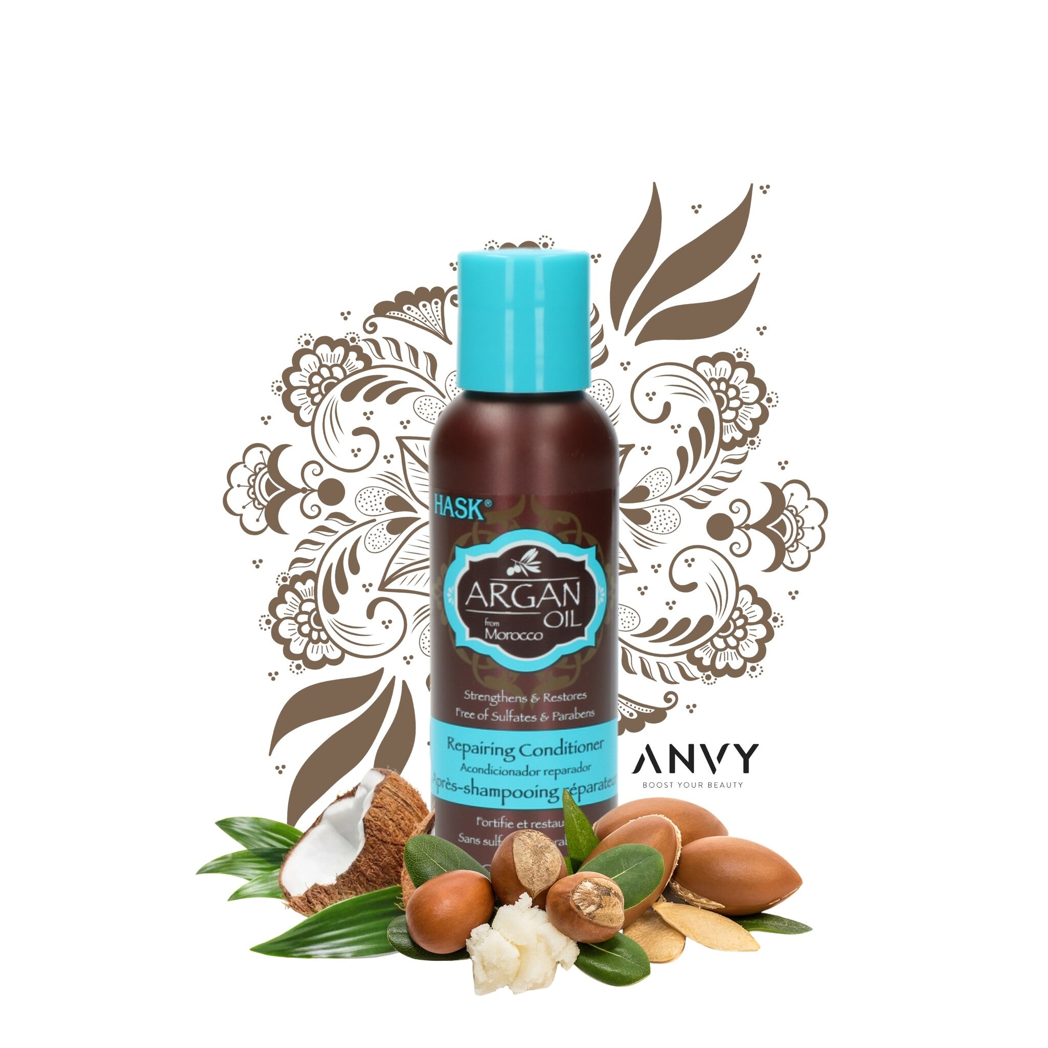 Argan Oil Repairing Conditioner Travelsize van Hask in een bruine fles met blauwe dop, omringd door natuurlijke ingrediënten.