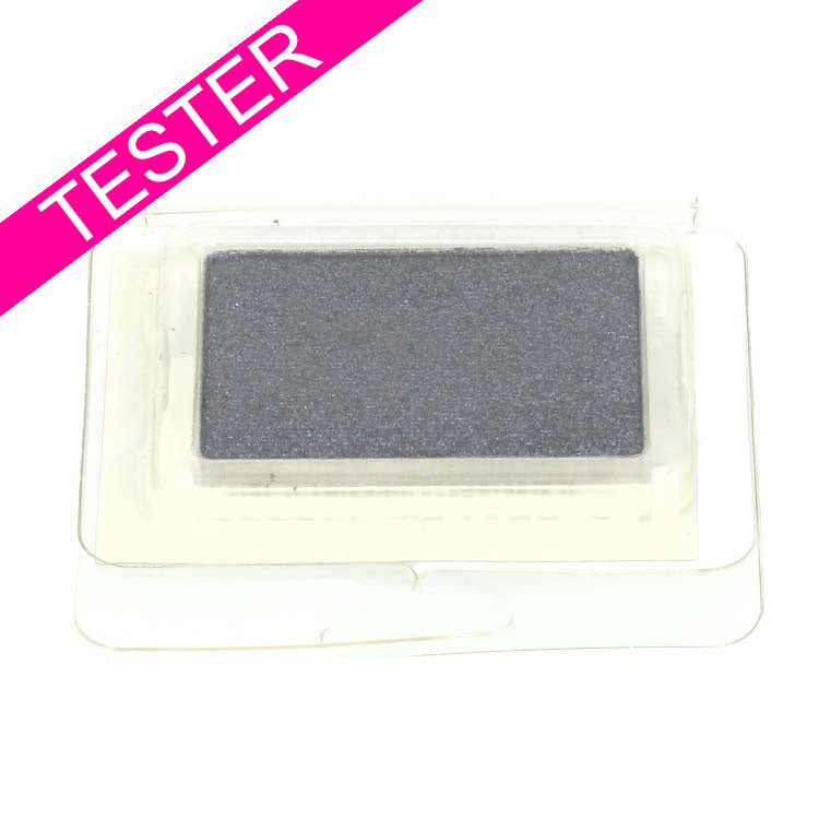 Eyeshadow Monos - Play Thing Tester in een doorzichtige verpakking met een donkergrijze oogschaduw.