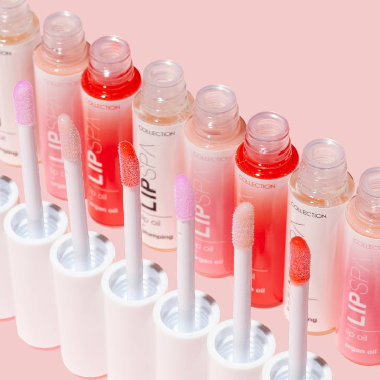 Lip Spa Lip Oil in verschillende kleuren, met een handige applicator en een stijlvolle verpakking.