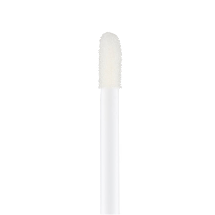 Lip Spa Lip Oil in een witte verpakking met een applicator voor een glanzende, hydraterende liplook.