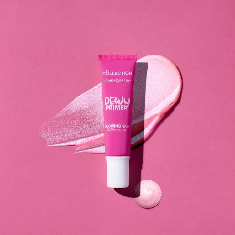 Primed & Ready Dewy Primer in een felle roze tube met een glanzende, lichte textuur op een roze achtergrond.