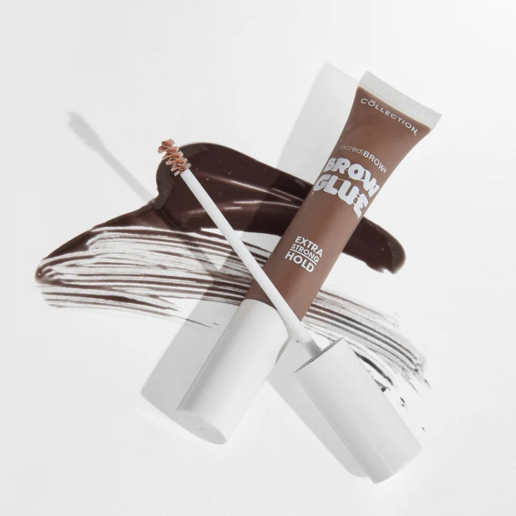 Incredibrow Brow Glue in een bruine tube met applicator, omgeven door een bruine kleurstreek. Extra sterke hold.